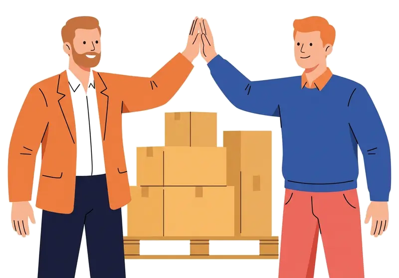 Two men giving a high five over a pallet of boxes