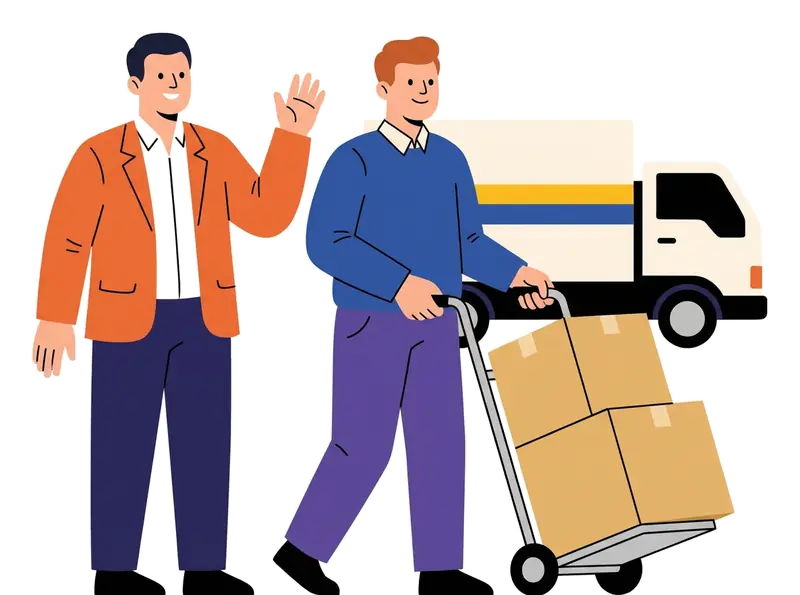 A man waving while a colleague wheels boxes to a delivery truck